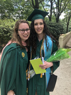 Irene Parriski (right) standing beside Professor McDonald at the 2019 graduation ceremony